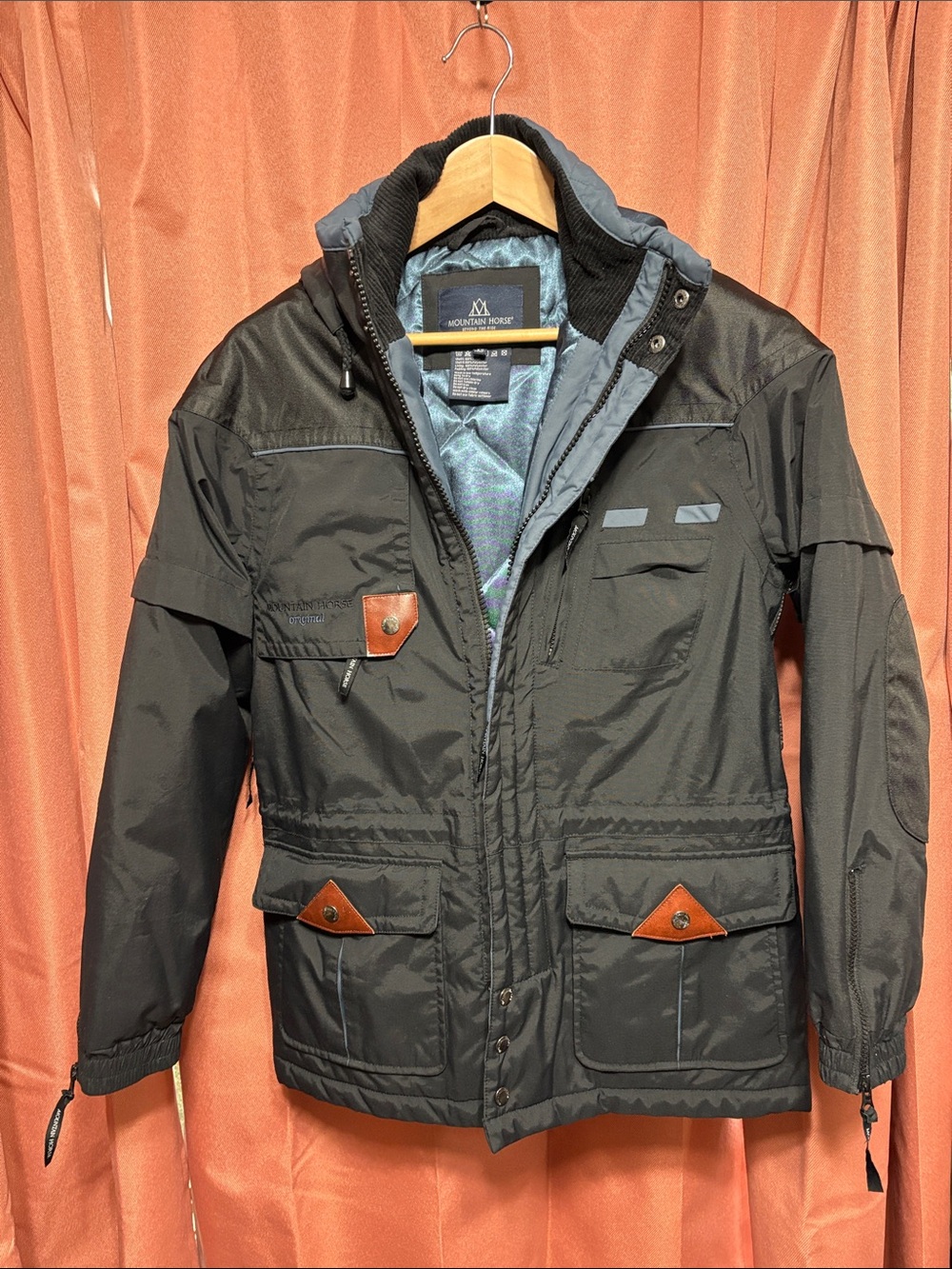 Mountain Ridge Equestrian Rocky Ridge, Winter Jacket. Black with blue lining